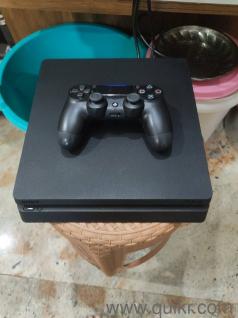 sony playstation 4 slim  with 2 controllers