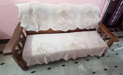 Gently used sofa 3 plus 1 plus 1 seater solid wood sofa with soft cushions in working condition 