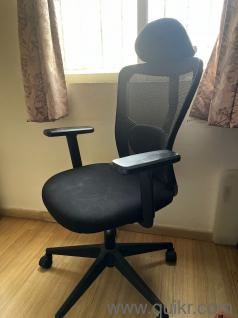 Office chair with neck support and wheels