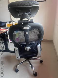 Black adjustable office chair. Condition is good but not great