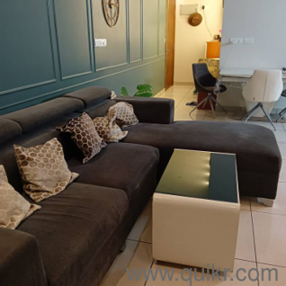 Right aligned 3 seater dark grey sectional fabric sofa with lounger. 