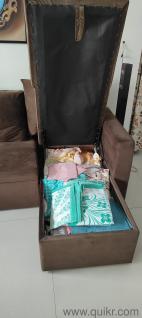 L-shaped sectional sofa cum bed with storage in very good condition