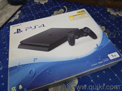 ps4 slim 1tb with 7 cds with 2 online purchased games(Witcher and batman arkam collection of 3 games)