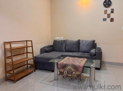 Clean new L shape gray color sofa with coffee table