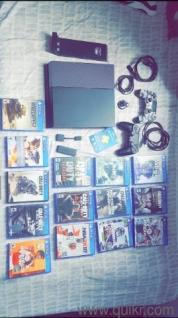 Sony PS4+ 2 controllers + 14 game discs