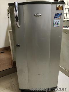 Whirlpool refrigerator single door silver grey color in working condition gently used