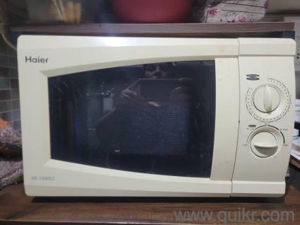 selling Solo microwave as moving out .