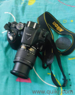 Nikon DSLR + Almost like new + selling it as DSLR craze is gone + 18-55 mm lens 