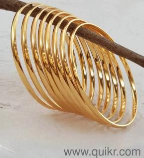 "Hand bangles in gold coated" and small beautiful beats chain.