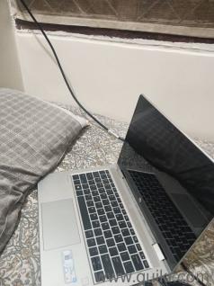 A 1 year old laptop with pen and touch support also have 65w charger.