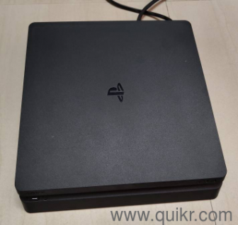 PS4 Slim 1TB + 2 Controllers + 3 Games  Good Condition