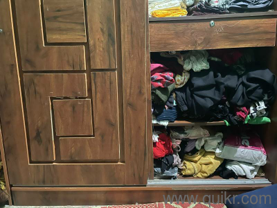 Urgent sale as I am shifting house. Selling my big sliding-door cupboard with free table
