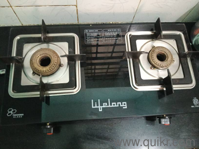 glass stove with two burners just 3 months old given with regulator and cylinder pipe.