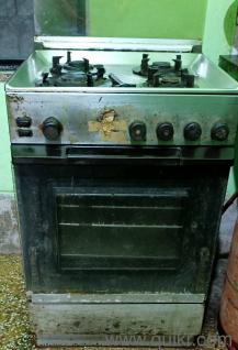 Philips Holland 4 burner stainless steel cooking range with oven and grill.It is in perfect working condition.
