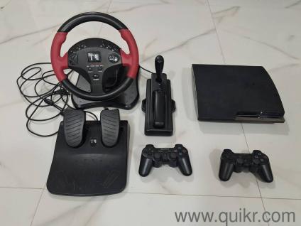 PS-3 + 16 GAMES ( GTA-5, LAST OF US , AND MORE) + 2 sony controllers and also steering 