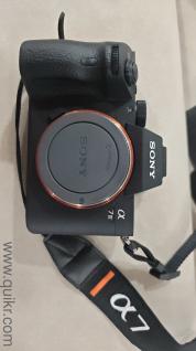 Sony Alpha 7 III camera with lens, battery pack case and Adventura bag