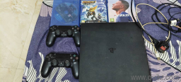 PS4 Slim 1TB + 2 Controllers + 3 Games (God of War, Ratchet & Clank, FIFA 22)