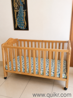 Solid and strong wood kids crib, can be used up to age 8