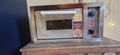 commercial pizza,oven 6 month use only its new conddition