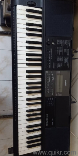 veryless used, almost new, with adapter, box, stand, and note stand 