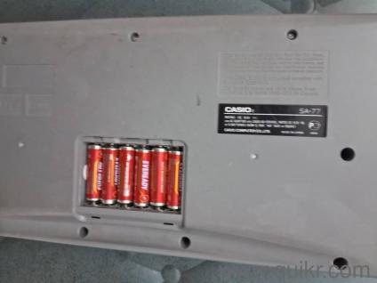 Casio SA-77 piano with battery but no battery cover