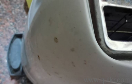 selling toaster,in good condition,white coloured