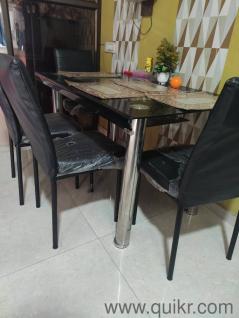 Title: 4-Seater Wooden Dining Table  Excellent Condition | Well Maintained