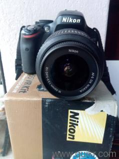 Nikon 5100 extra lens battery charger 4GB card very good condition