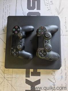 Selling: PS4 slim 1TB with 2 controllers