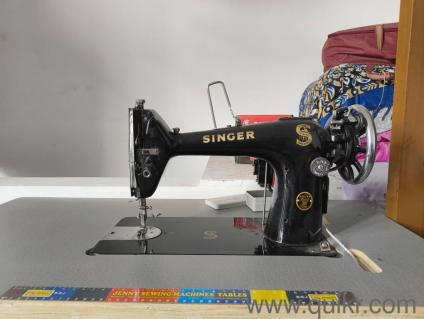 Singer sewing machine  with table and motor of singer 
