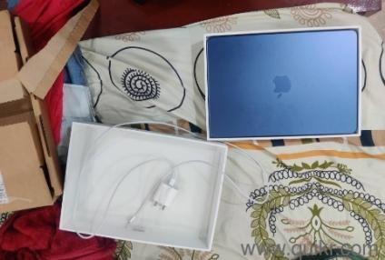 One day used mac neo 512 GB indigo colour for sale with apple care and additional accessories.