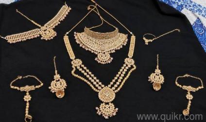 beautiful bridal jewellery set. 2 necklace, 1 pair earings ,1 pair hathful.1 matha patti,1 nath