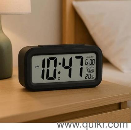 brand new digital clock( alarm setting can also be done)