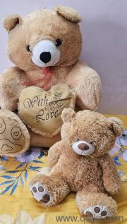 Teddy bear one is human size and one small