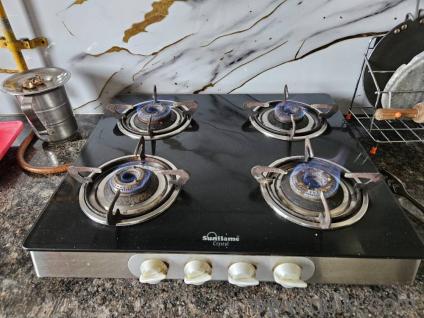 Its sunflame gas stove with 4 burners. The stove works fine and it's just seems to be in new condition.
