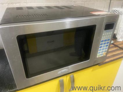 Kitchen Appliance: LG Fridge & Whirlpool Microwave