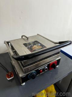Sandwich grill toast is of Woonder cook galaxy brand and is in a very good condition