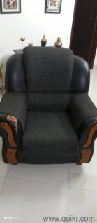 Sofa set is teak wood frame with foam and fabrics on outer part. 