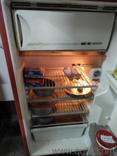 Whirlpool 210 litre cherry red colour fridge working in a very good well maintained condition