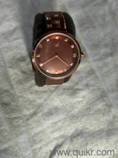 Fastrack fleek quartz analog brown dial stainless steel watch