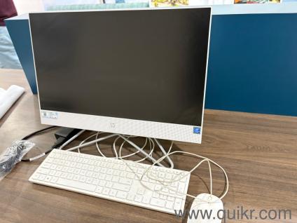 Sleek HP All-in-One system (monitor + CPU combined)