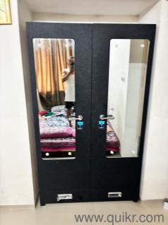 Metal cupboard brown in colour 