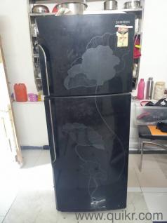 Samsung Refrigerator with working condition storage is 255 liters