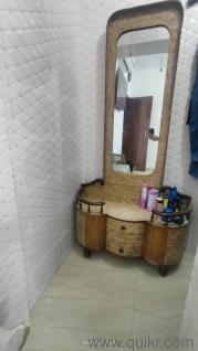 # Brown colour dressing table.  # Good Looking.  # 5 Drawers  # mirror attached  # place to put cosmetic items.  # Dimensions: 70*37 inches