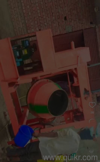 Concrete mixture machine in good condition, used for mixing cement and sand for construction."
