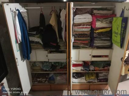 wardrobe in good condition and hardplywood white sunmica inside and  huge space 4 drawers in down