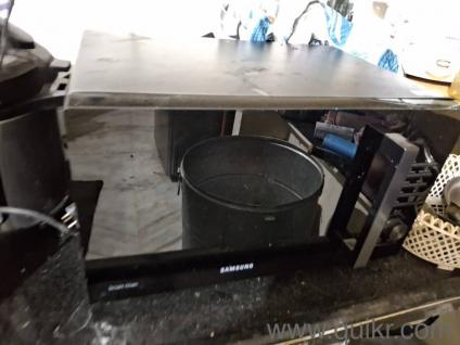 almost new with utensils & grill stand gloves