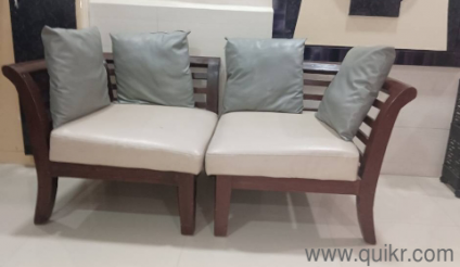 Wooden sofa 2 seater in a good condition 