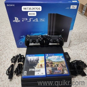 98735..39705 sony playstation ps4 pro 1tb with 2 controller and 4gaming cds in warranty 