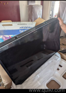 Sony TV with speaker and fire stick